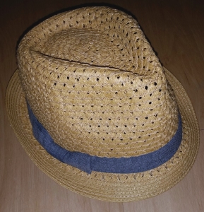 Straw hat with blue ribbon